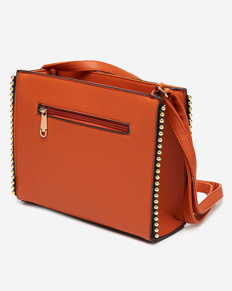 Klassische orangefarbene Handtasche mit Dekoration - Accessoires