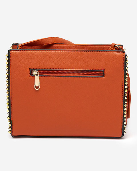 Klassische orangefarbene Handtasche mit Dekoration - Accessoires