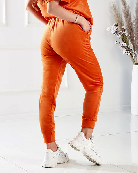 Orangefarbenes Damen-Sport-Set mit Zierknöpfen - Kleidung