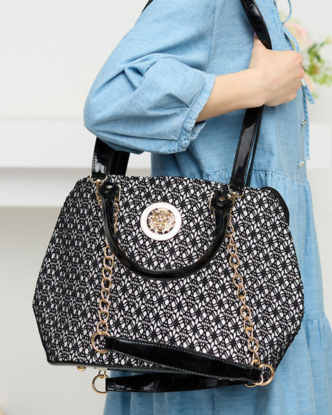 Schwarz-weiß glänzende Damenhandtasche - Accessoires
