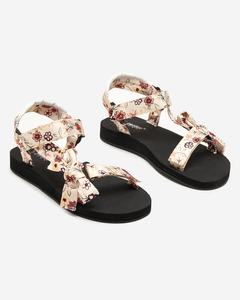 Schwarze Damensandalen mit beigen Blumenstreifen - Schuhe