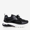 Schwarze Sportschuhe auf der Igalea-Plattform - Schuhe 1
