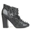 Schwarze Stiefel am Pfosten mit Tralla-Nieten verziert - Schuhe