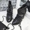 Schwarze Stiefel am Pfosten mit Tralla-Nieten verziert - Schuhe