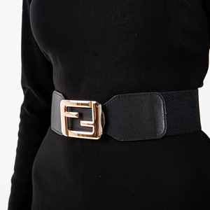Schwarzer elastischer Gürtel mit dekorativer goldener Schnalle - Accessoires