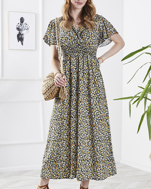 Жіноча квіткова сукня міді чорного кольору - Одяг