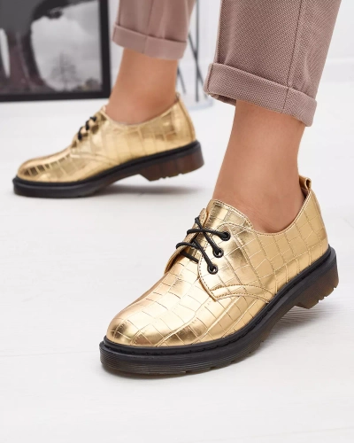 Goldener Damenschuh mit Seniri-Prägung - Schuhe