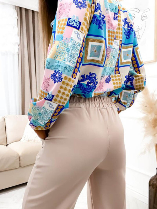 Бежеві жіночі широкі штани - Одяг