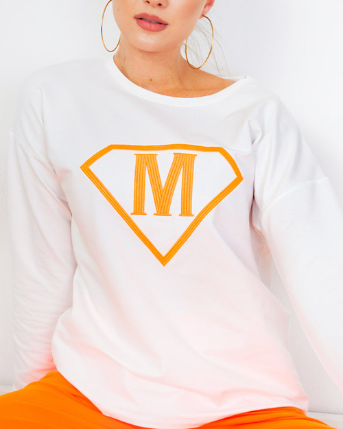 Біло-помаранчевий спортивний жіночий комплект