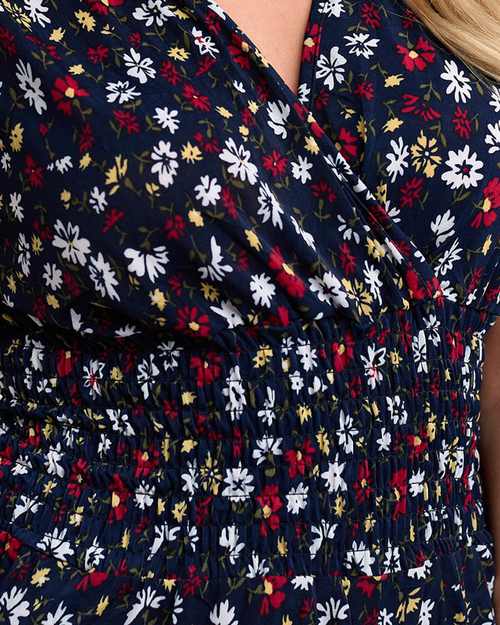 Жіночий темно-синій комбінезон з квітами - Одяг