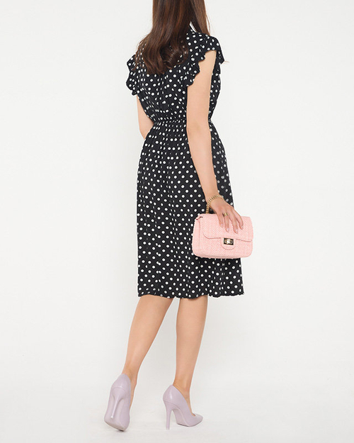 Чорна жіноча сукня в горошок