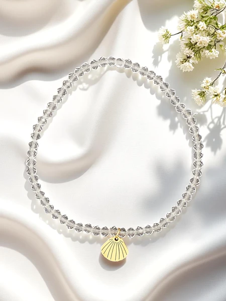 Royalfashion Damenarmband mit Muschelanhänger