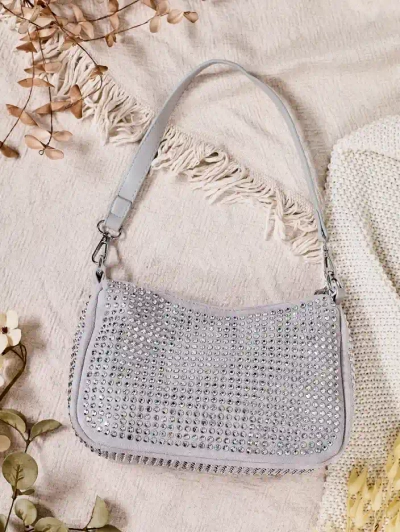 Royalfashion Kleine Handtasche für Frauen mit Nieten