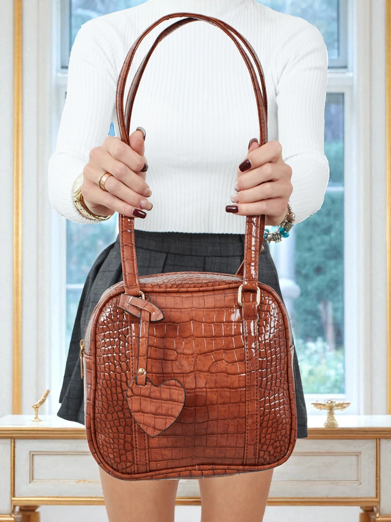 Lackierte kleine Damenhandtasche aus Öko-Leder Velinne