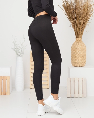 Schwarze isolierte Damen-Leggings- Bekleidung