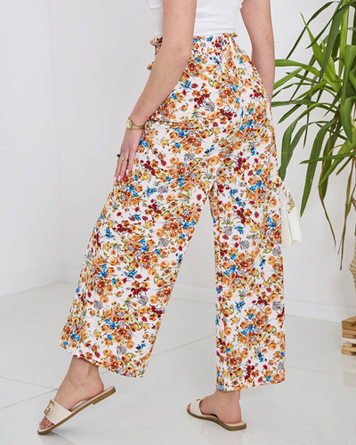 Weiße Damen-Palazzohose mit orangefarbenen Blumen- Kleidung