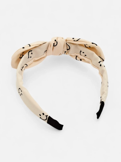Royalfashion Kinderhaarband mit Schleife und Print aus lächelnden Gesichtern