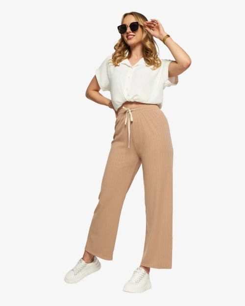 Жіночі широкі брюки на резинці світло-коричневого кольору - Одяг