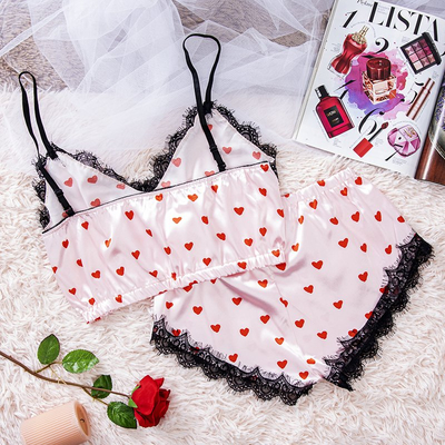 Hellrosa Damenpyjama mit Herzdruck - Kleidung