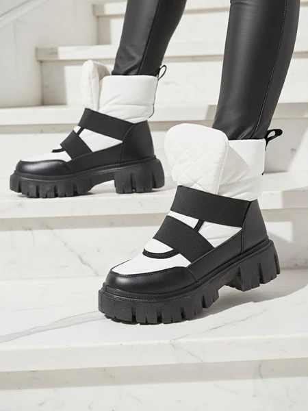 Damen-Schneestiefel mit flacher Sohle in schwarz-weiß Ferory- Footwear