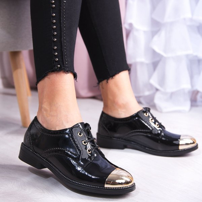 Schwarze Schuhe mit goldenem Zehenanzug - Schuhwerk