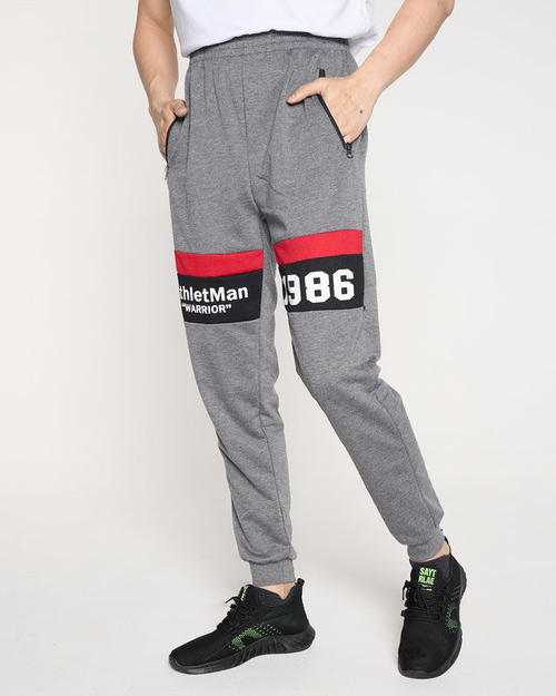 Чоловічі сірі спортивні штани з написами - Одяг