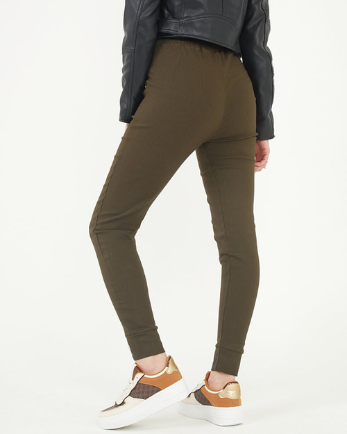 Зелені трегінси з декоративними написами