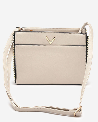 Klassische beige Handtasche mit Dekoration - Accessoires