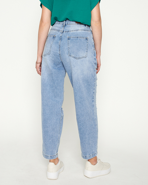 Світло-блакитні рвані джинси для жінок - Одяг