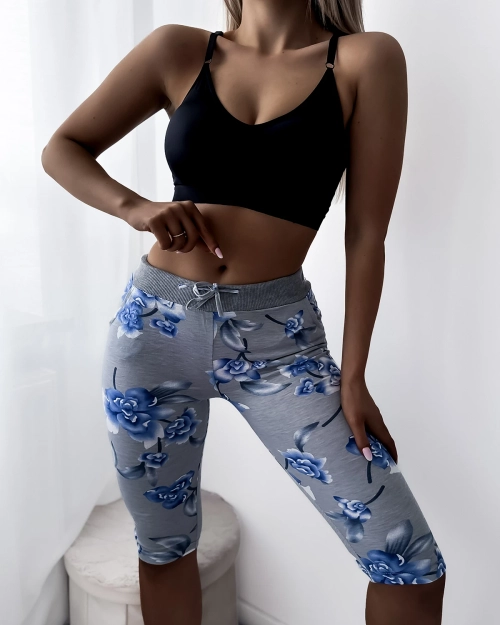 Сірі жіночі легінси 3/4 довжини з принтом