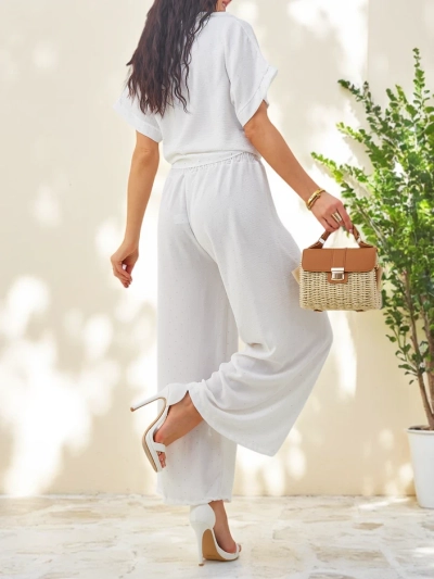 Royalfashion Damen Set mit einem gebundenen Kurzarmhemd und ausgestellten Hosen mit Strasssteinen