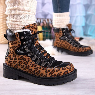 Stiefel mit Leopardenmuster, isoliert mit Dori-Schaffellmantel - Schuhe