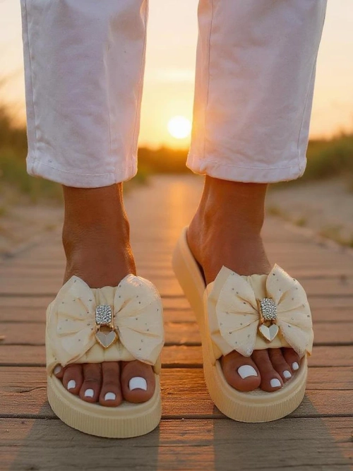 Royalfashion Жіночі шльопанці на платформі з бантиком Sento Pace