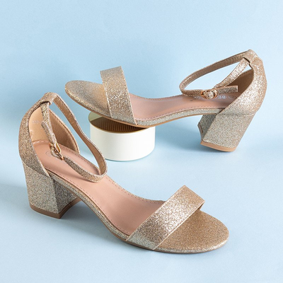 Золоті жіночі босоніжки з блискітками Brossina