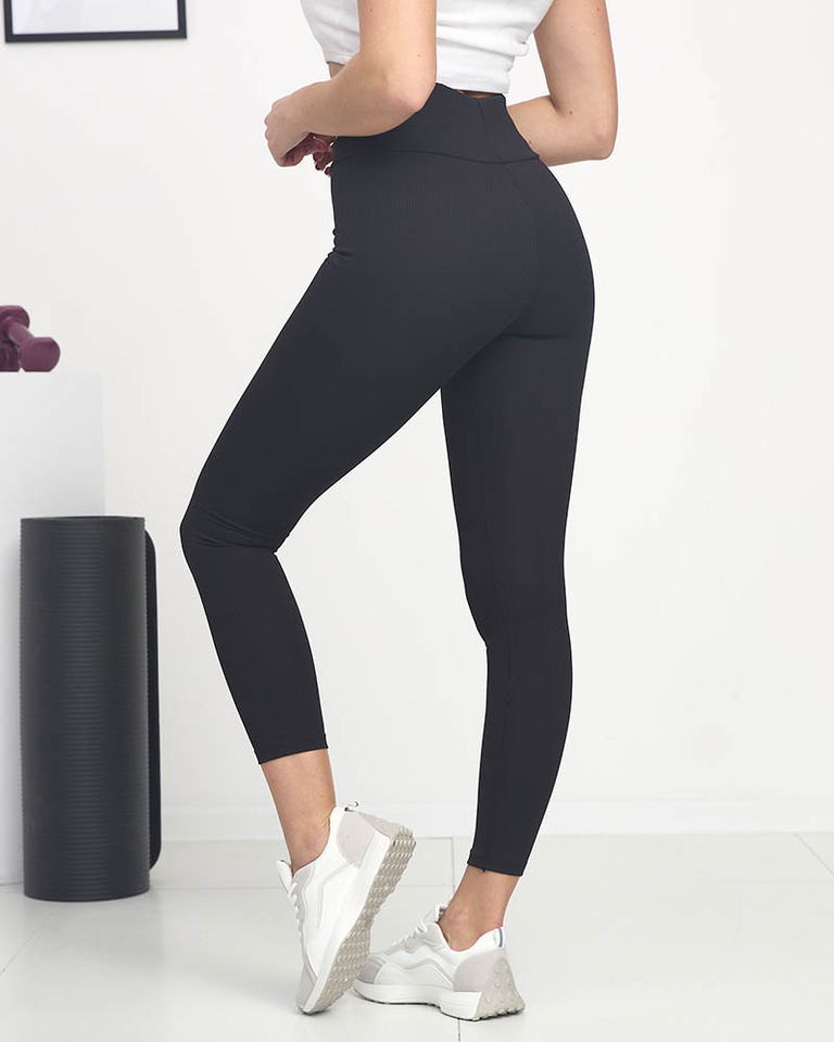 Schwarze gerippte Damen-Leggings mit weißem Schriftzug - Kleidung