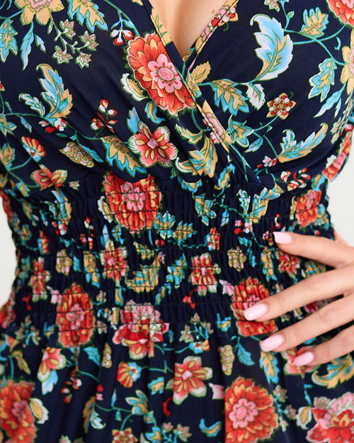 Жіночий темно-синій короткий комбінезон з квітковим візерунком - Одяг