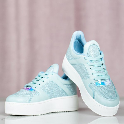 Blaue Sportschuhe auf der Salsa-Plattform - Schuhe 1