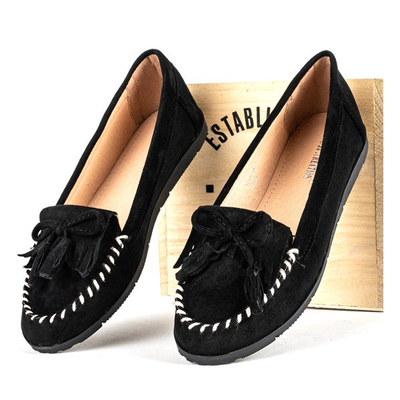 Schwarze Slipper auf einer flachen Sinsej-Sohle - Schuhe