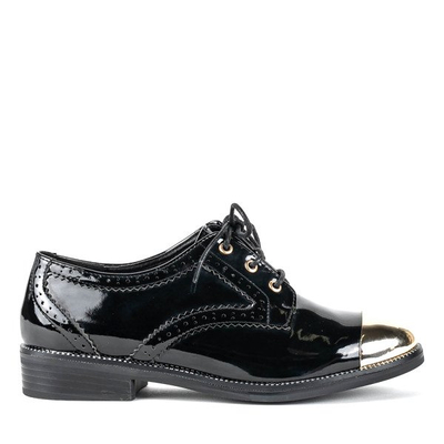 Schwarze Schuhe mit goldenem Zehenanzug - Schuhwerk