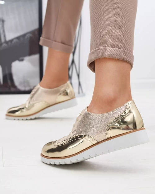 Жіночі оксфорди в золотому кольорі з блискучими вставками Retinisa