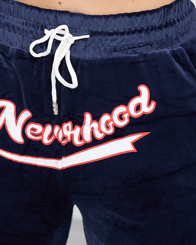 Темно-сині жіночі велюрові спортивні штани з написом