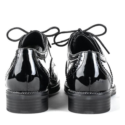 Schwarze Schuhe mit goldenem Zehenanzug - Schuhwerk