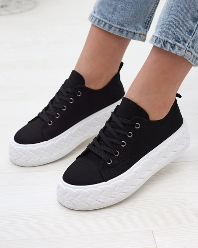 Schwarze Sport-Sneakers auf einem Plateau Saddol- Footwear