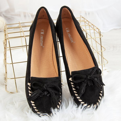 Schwarze Slipper auf einer flachen Sinsej-Sohle - Schuhe
