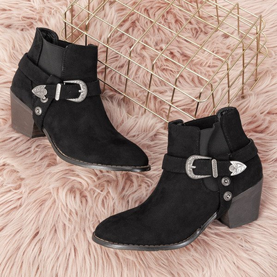 Schwarze Stiefel auf einem niedrigen Pfosten Asiene Cowboystiefel - Schuhe