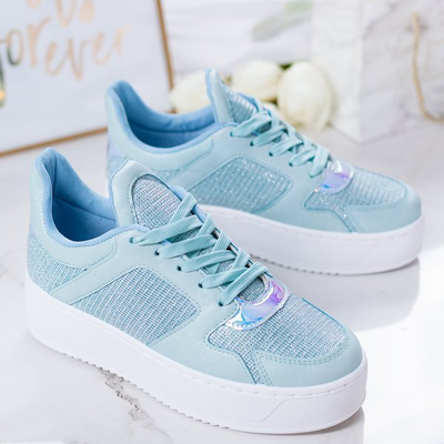 Blaue Sportschuhe auf der Salsa-Plattform - Schuhe 1