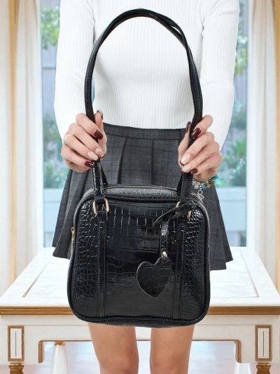 Lackierte kleine Damenhandtasche aus Öko-Leder Velinne