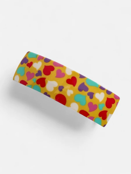 Farbenfrohe Kinderhaarspange mit Herzen