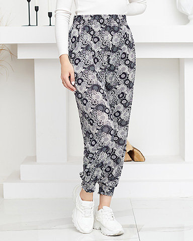 Gemusterte, marineblaue und weiße Damenhose in PLUS SIZE - Kleidung