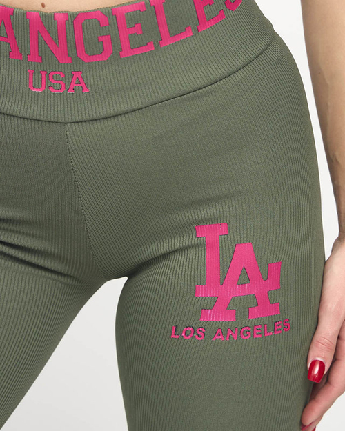 Зелені легінси в рубчик з рожевим написом